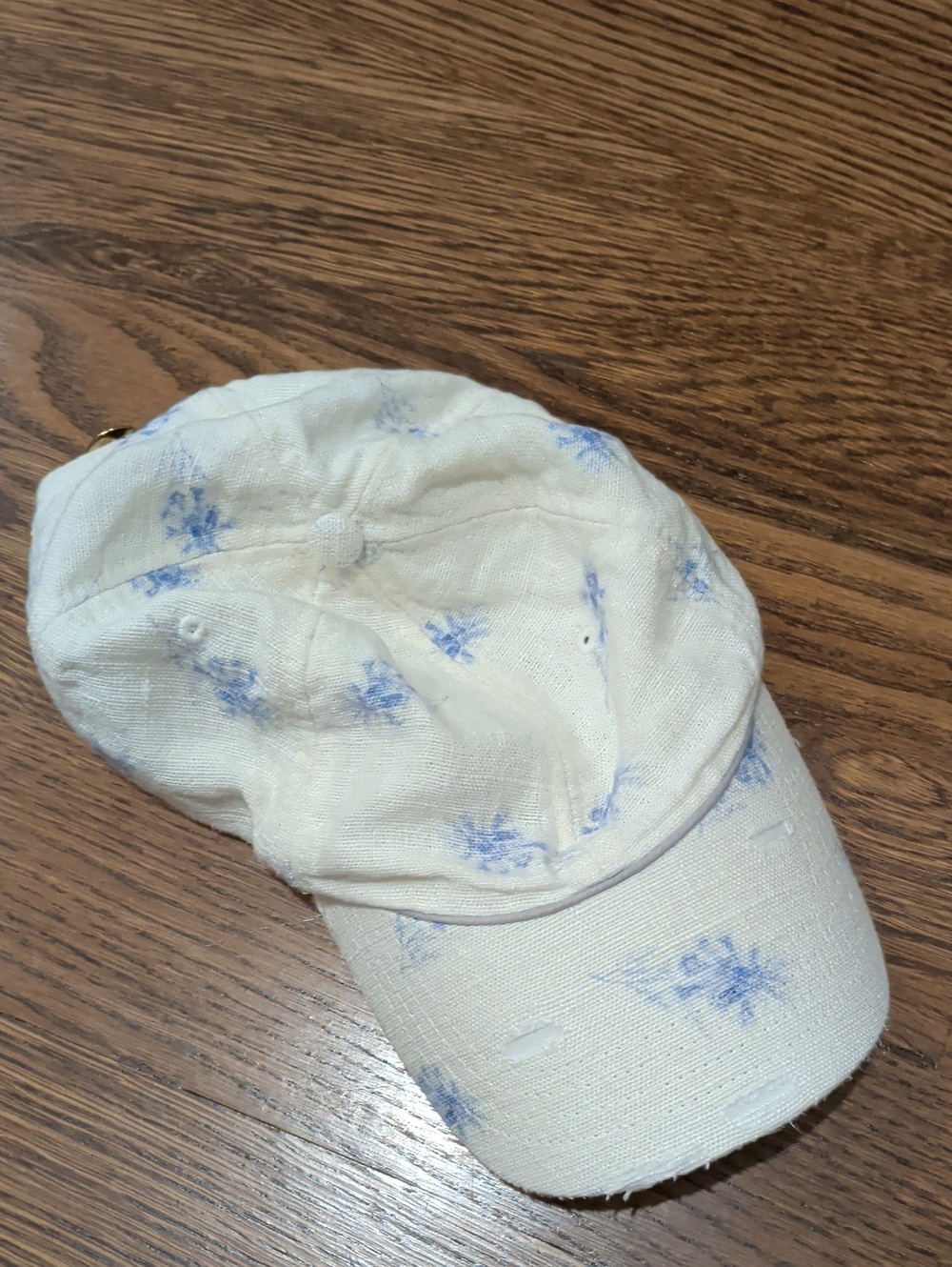 LoveShackFancy Distressed Cream Baseball Cap with Light Blue Floral Print